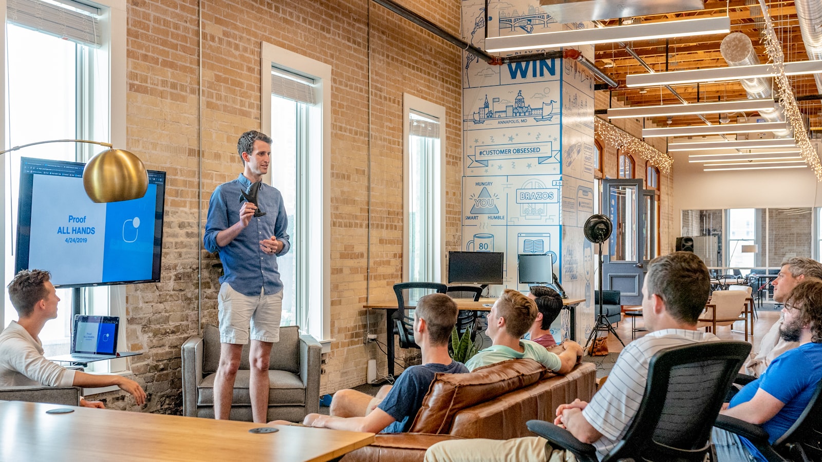 A small business owner answering calls with the help of an AI receptionist