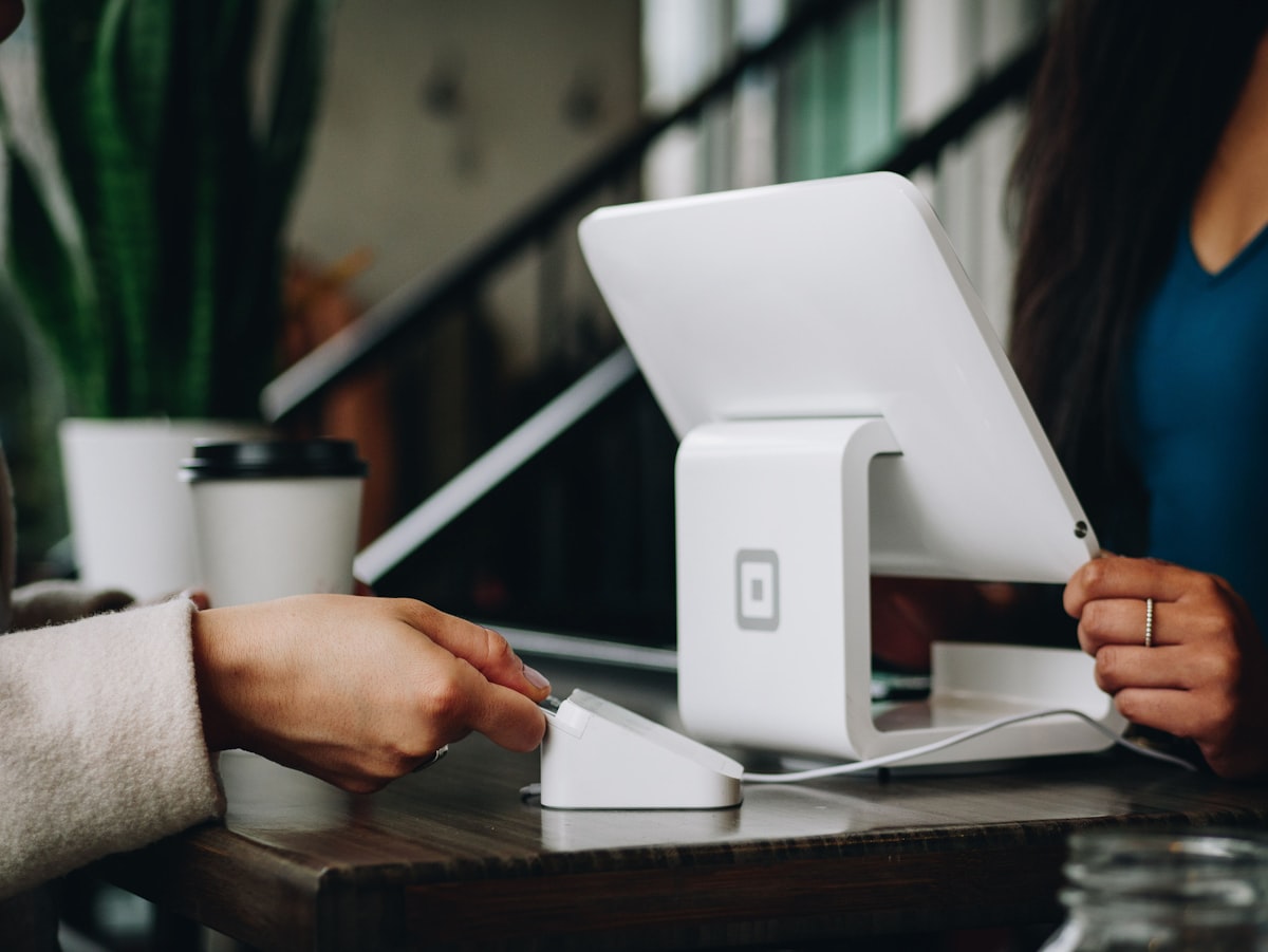 Small business owner using AI tools to run their business